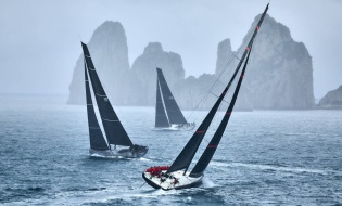The Maxi 72s and the ClubSwan 80 My Song approach the Faraglioni rocks while circumnavigating Capri during the 2023 IMA Maxi Europeans. Photo: Studio Borlenghi