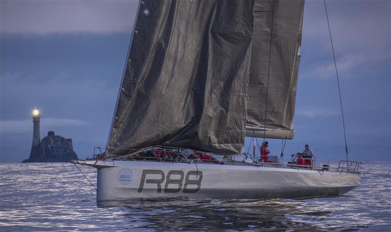 George David's RAMBLER 88 (USA) rounding the Fastnet rock at dawn | Photo By: Rolex / Daniel Forster